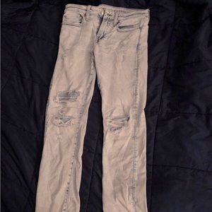 Acid wash and ripped American eagle jeans 31x32